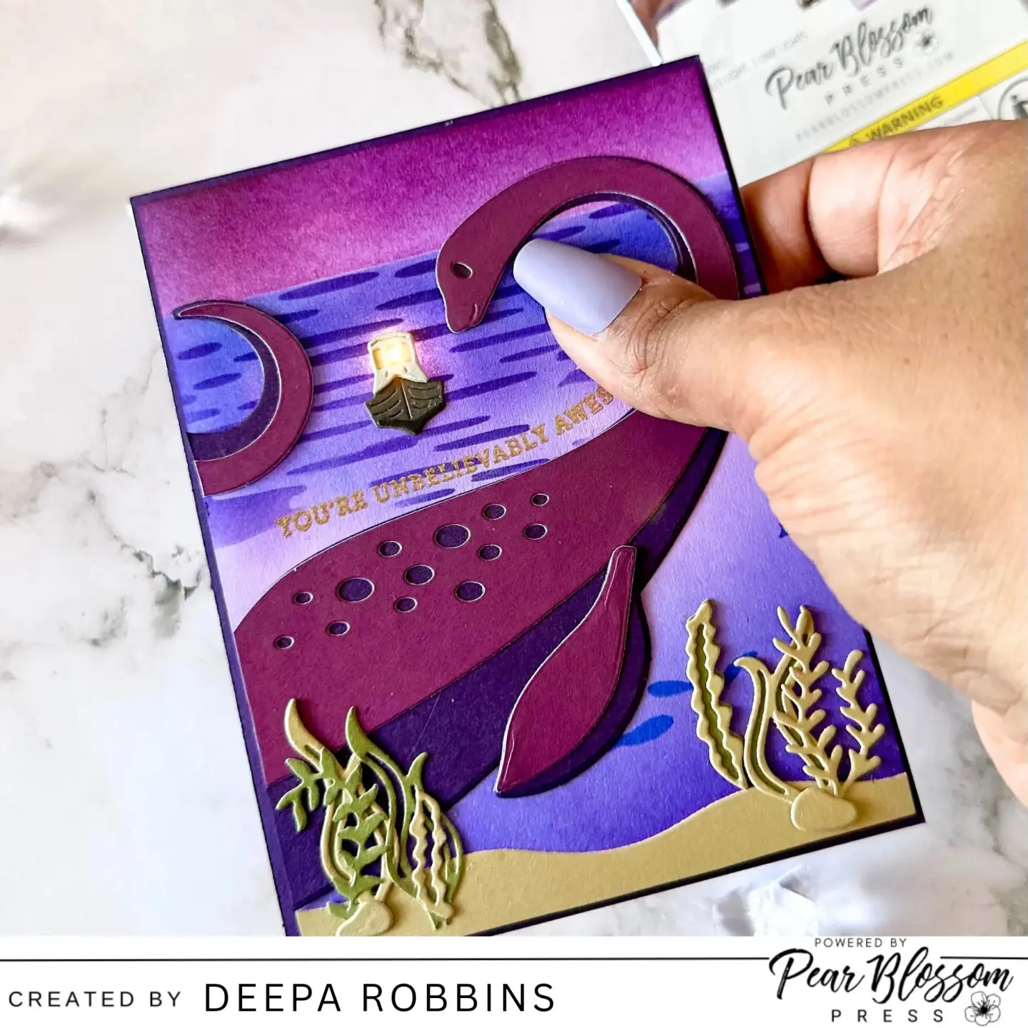 Magical Loch Ness Monster Light-Up Card with Pear Blossom Press One Lights

Hi crafty friends - it’s Dee from @deezinesbyd here and today I’m sharing a card that brings a little magical mystery to your craft table! This sweet interactive card features an adorable Loch Ness Monster-inspired scene complete with glowing nighttime waters and a tiny illuminated boat sailing above our gentle little lake monster friend. There’s something extra special about a handmade card that lights up — it instantly turns your project into an unforgettable experience! To create the magical glow, I used Pear Blossom Press’ amazing One Lights. I tucked the light behind the tiny boat to create the illusion of a lantern shining across the dark waters of the lake....

https://pearblossompress.com/magical-loch-ness-monster-light-up-card-with-pear-blossom-press-one-lights/?utm_source=instagram-business&utm_medium=jetpack_social