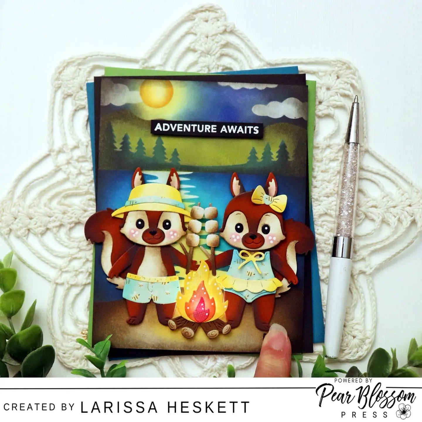 Hello Crafty Friends!! Larissa here today to share a FUN Bonfire Card today using the One Light to make the Bonfire Light Up!! SQUEAL!! I LOVE how this brings the scene to LIFE!! These Summer Camp Images are so SWEET and can be paired with ANY of the Lights to create One of a Kind Cards that would be AMAZING to send with a Child to Summer Camp!! Hope this INSPIRES you!! Happy Crafting, Friends!! 🩵 #pearblossompress #onelight #interactivecards #teamspellbinders #wowembossingpowder