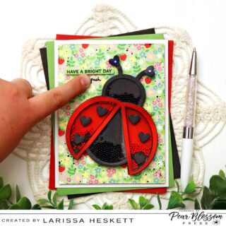 Hello Crafty Friends!! Larissa here today to share this ADORABLE Twinkling Ladybug Shaker Card!! I just LOVE Double Interactive Cards and this one is certain to bring a smile to the recipient’s Face!! I’ve used the Twinkling Lights to make the Heart Antennae Twinkle!! SQUEAL!! There are so many FUN ways you can bring your Shaker Images to LIFE!! I hope you feel INSPIRED to give this Design a try!!?? Happy Crafting, Friends!! #pearblossompress #twinklinglights #interactivecards #prettypinkposh #wowembossingpowder