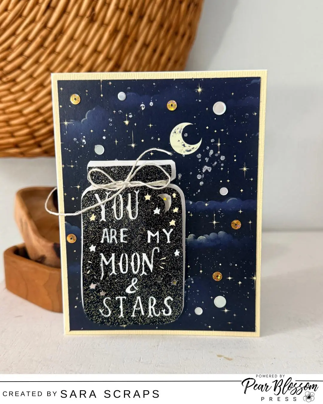 This new project from sara.scraps features a night sky design that comes to life with a soft glow thanks to a light-up element from Pear Blossom Press—because sometimes a sentiment deserves to shine just a little brighter. 
Watch the full process video on YouTube to see how it all comes together! #cardmaking #pearblossompress #brutusmonroe