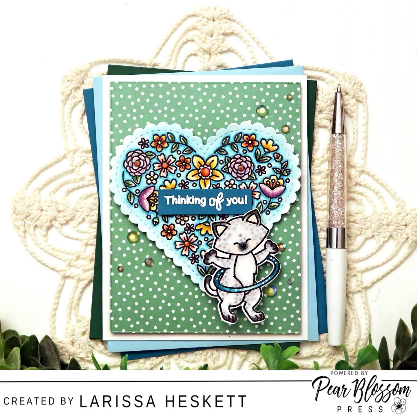 #interactivecards Hello Crafty Friends!! larissaheskettdesigns here today to share a SWEET Thinking of You Card using a Mini Action Wobble to help make the Kitten Hula Hoop!! SQUEAL!! This is SURE to bring a SMILE to the recipient and I hope it INSPIRES you to add some Action to your next Card Design!! Happy Crafting, Friends!! 🤍 #pearblossompress #miniactionwobble #newtonsnookdesigns #wowembossingpowder #interactivecards